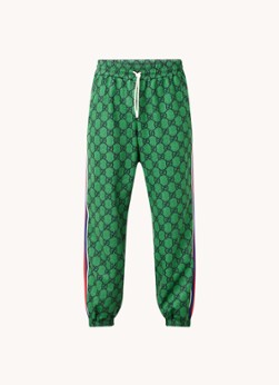 Gucci Tapered fit cropped trackpants met all over logoprint en ritsdetail