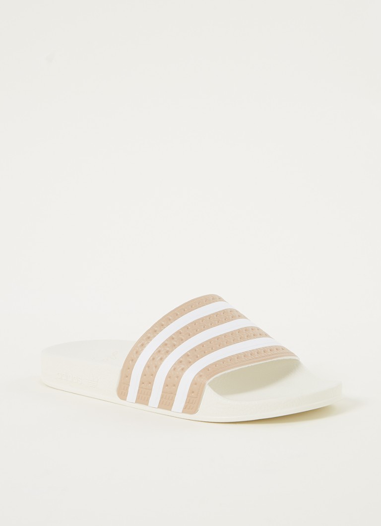 adidas Adilette slipper met streepprint • Beige • de Bijenkorf