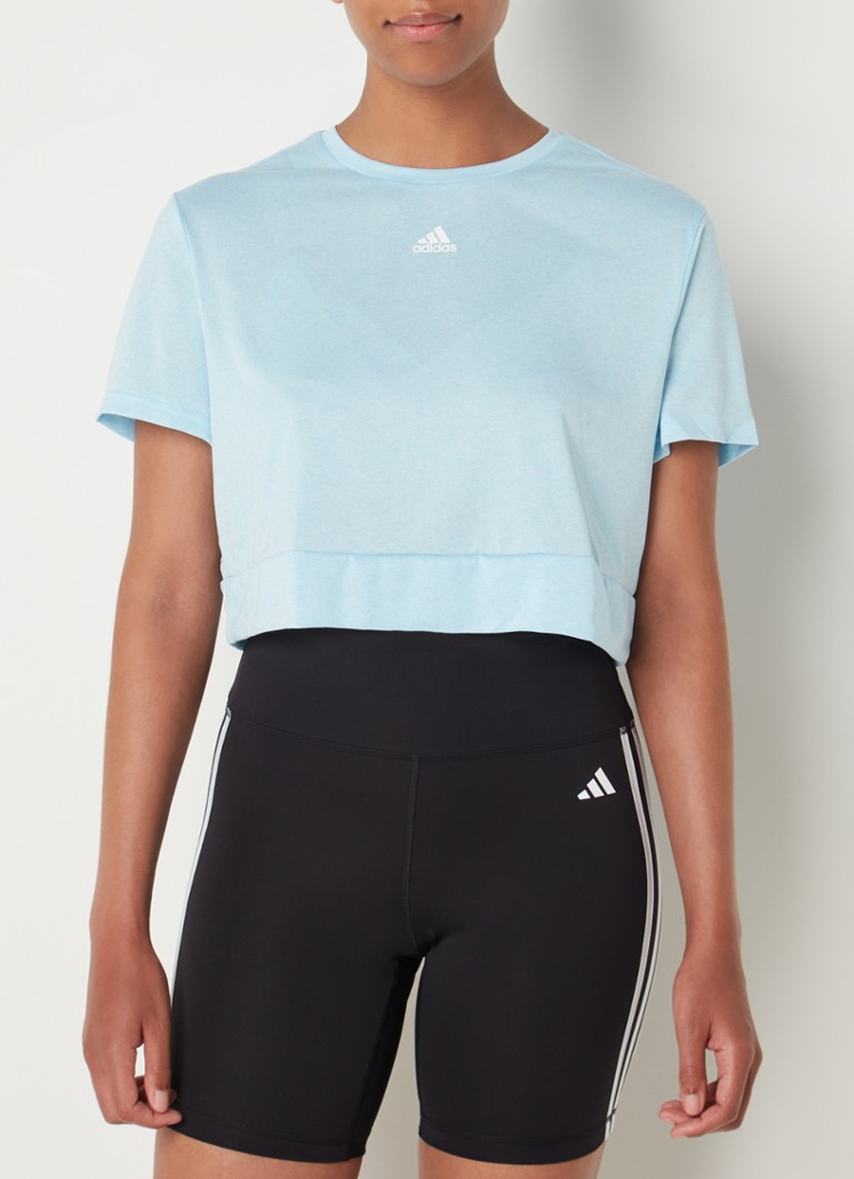 adidas - Cropped trainings T-shirt met logo - Lichtblauw