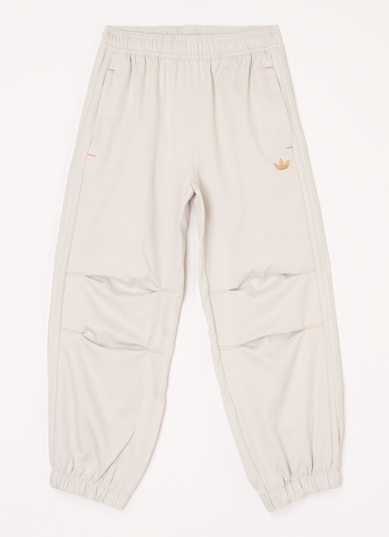 Adidas - Tapered fit trackpants met logo - Creme