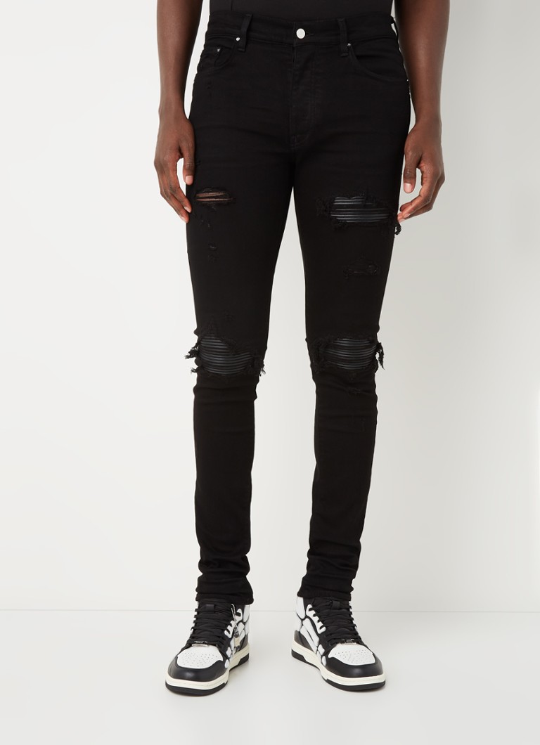 AMIRI - MX1 ripped skinny jeans met details van leer en stretch - Zwart