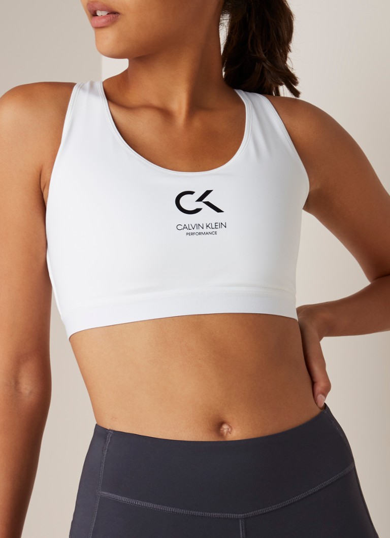 Calvin Klein - Sport bh met logo opdruk en light support - Wit