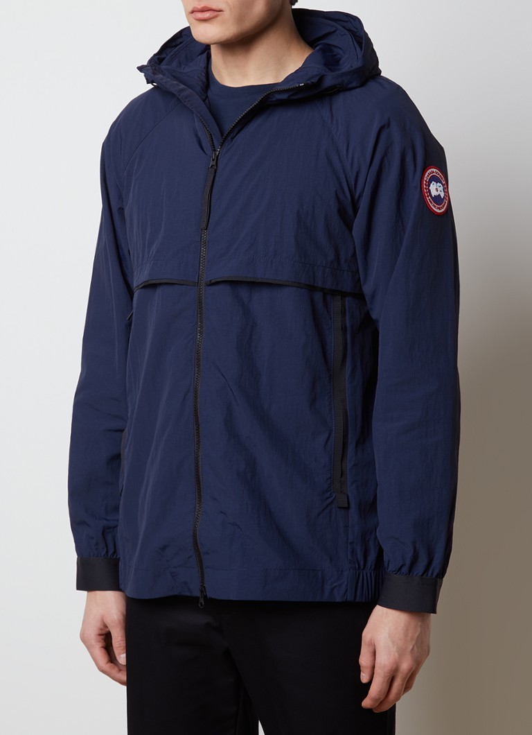Canada Goose Faber windjack met capuchon en ritszakken • Blauw • de
