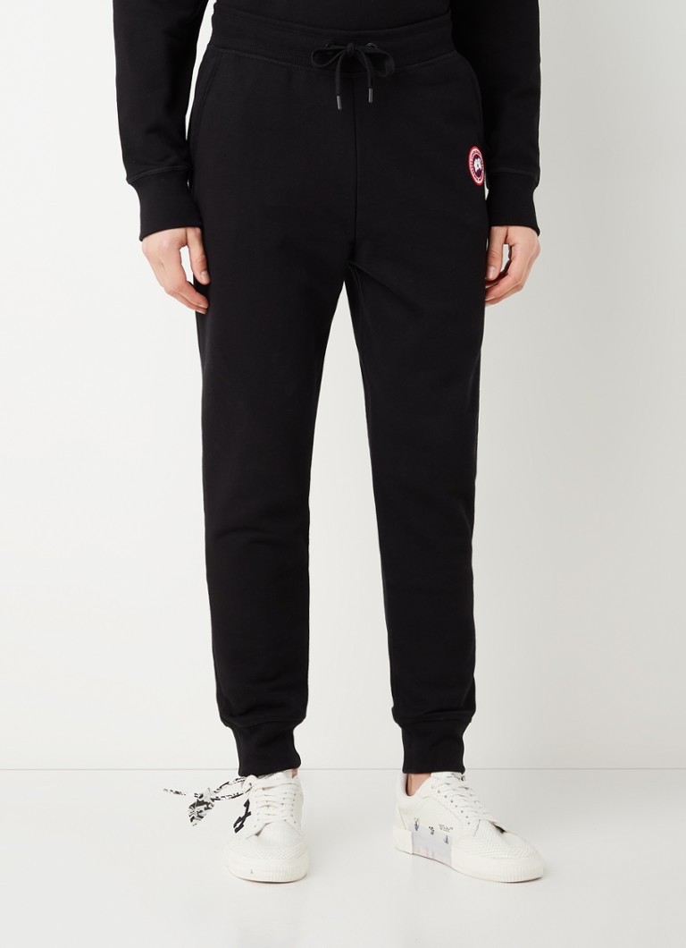 een kopje vergroting Verwisselbaar Canada Goose Huron tapered fit cropped joggingbroek met logo • Zwart • de  Bijenkorf