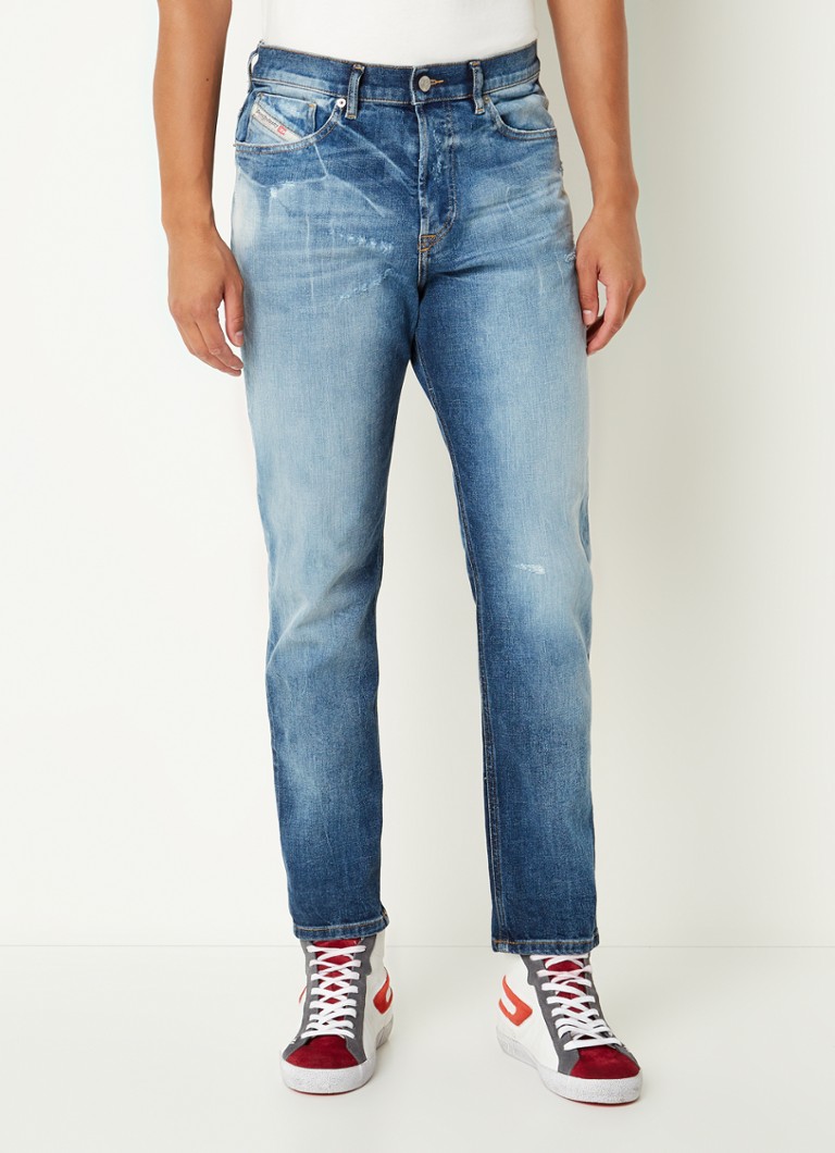 Diesel 2005 DFining tapered jeans met ripped details • Denim • de