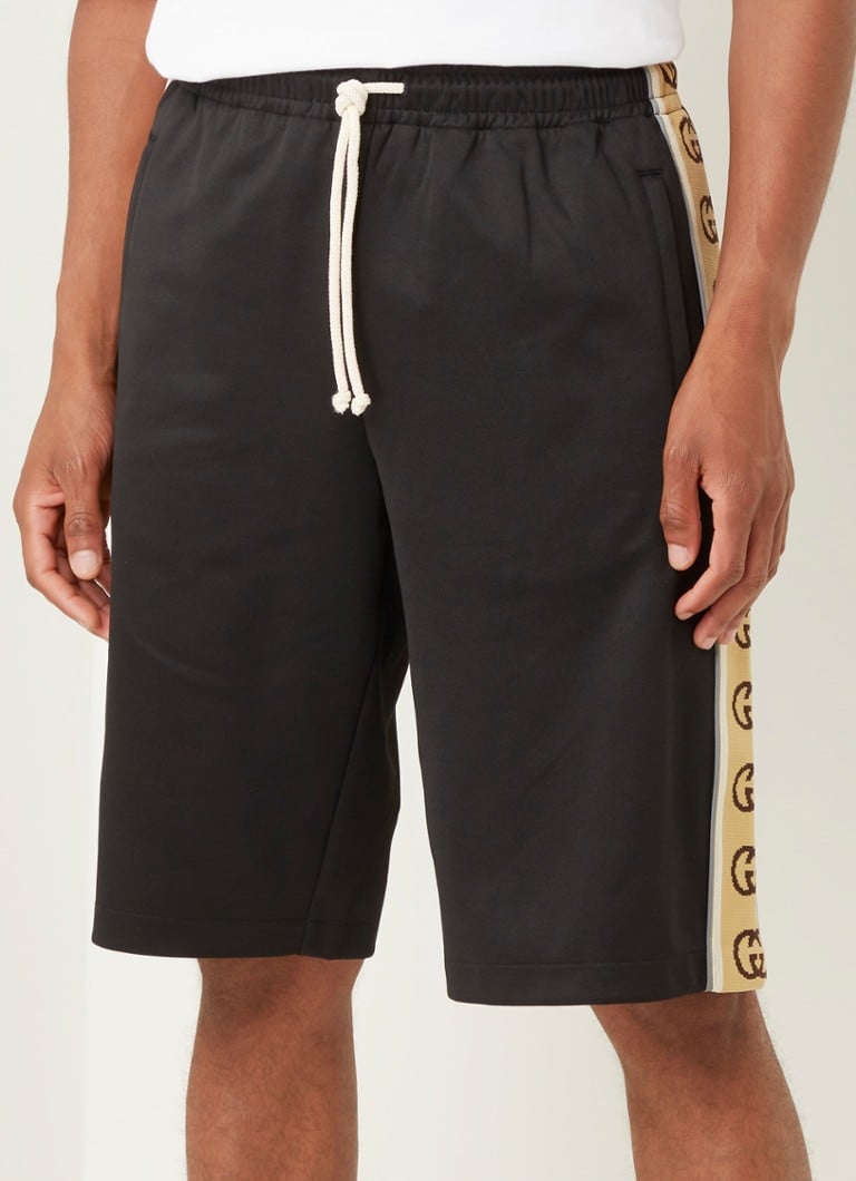 Ongrijpbaar wapenkamer staan Gucci Straight fit korte broek met logotape en ritszakken • Zwart • de  Bijenkorf