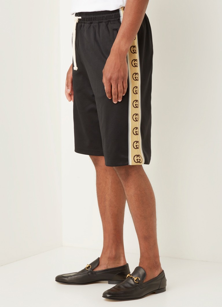 Ongrijpbaar wapenkamer staan Gucci Straight fit korte broek met logotape en ritszakken • Zwart • de  Bijenkorf