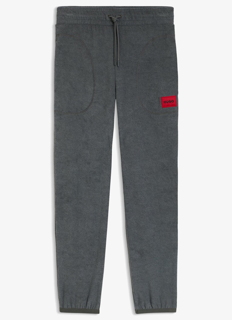 HUGO Heren Tapered fit joggingbroek met logo in de kleur Middengrijs