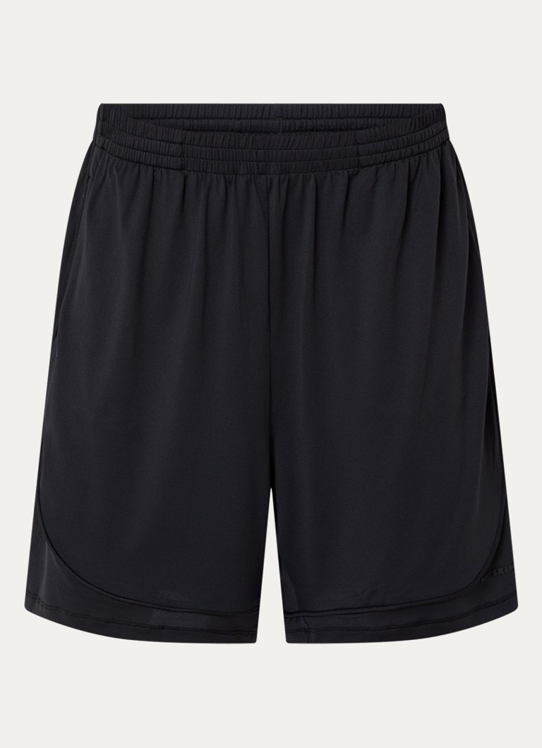 NikeSKIMS Dames Airy mid waist loose fit korte broek met ritszakken in de kleur Zwart, maat: S
