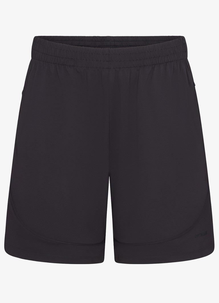 NikeSKIMS Dames Airy mid waist loose fit korte broek met ritszakken in de kleur Zwart, maat: S