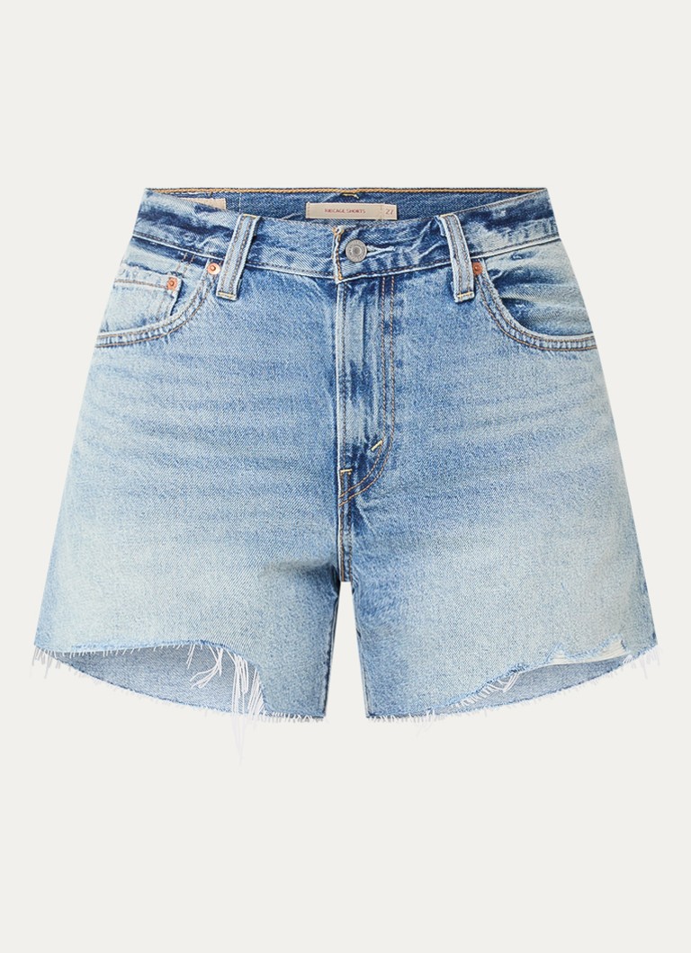 Levi's Dames Ribcage mid waist slim fit korte broek van denim met medium wassing in de kleur Indigo