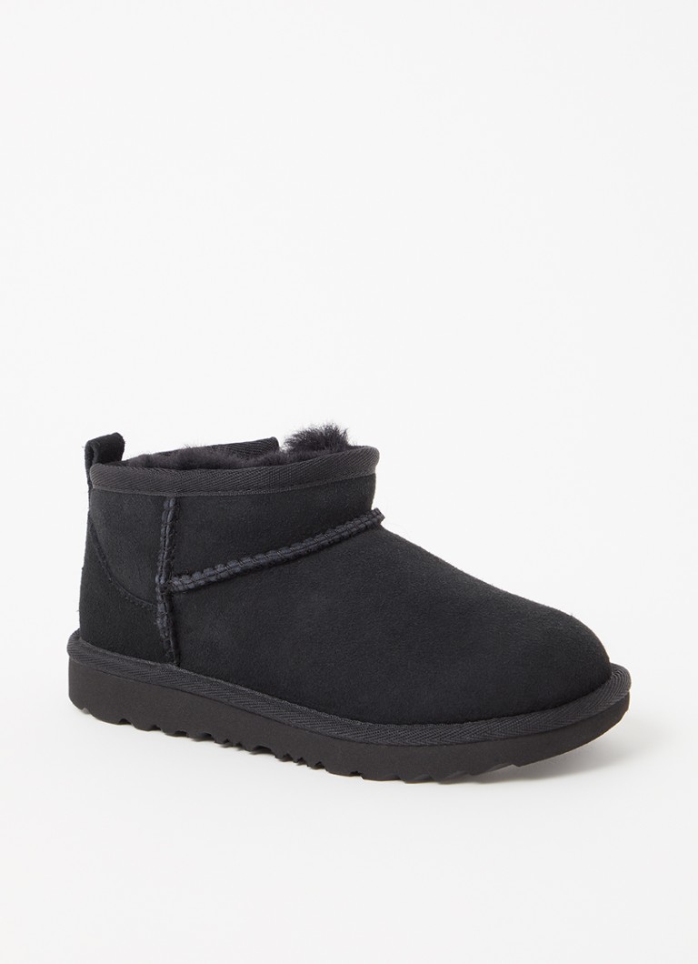 UGG Meisjes Classic Ultra Mini enkellaarsje van suède in de kleur Zwart, maat: 28.5