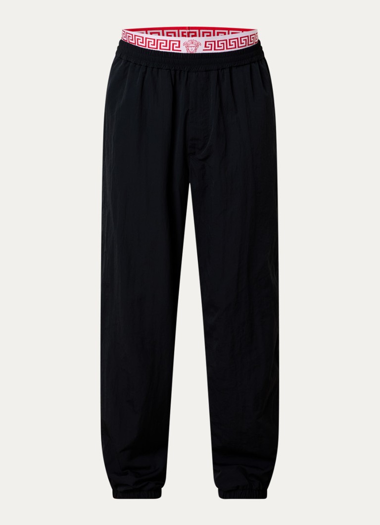 Versace Heren Wide fit trackpants met steekzakken en logo in de kleur Zwart, maat: 50