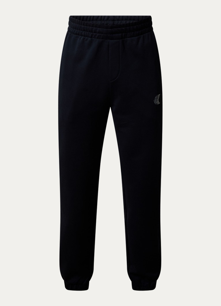 Moncler Heren Tapered fit joggingbroek met logo in de kleur Donkerblauw, maat: M