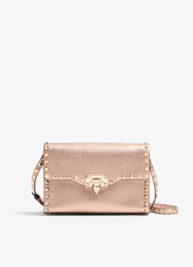 Valentino Garavani Dames Small crossbodytas van kalfsleer met metallic finish en studs in de kleur Roze