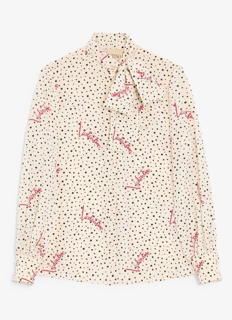 Valentino Garavani Dames Blouse van zijde met logoprint en strikkraag in de kleur Creme