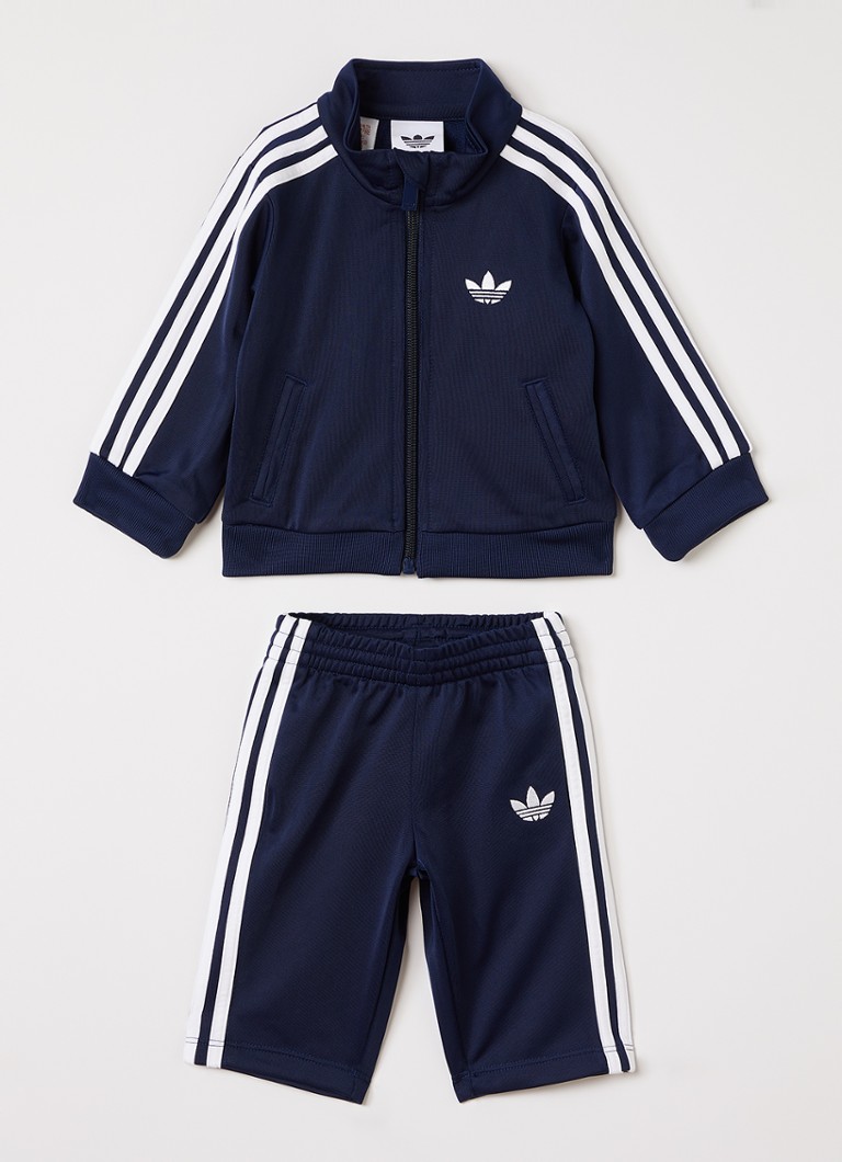 Adidas Meisjes Firebird set van trackvest met trackpants 2-delig in de kleur Indigo, maat: 86