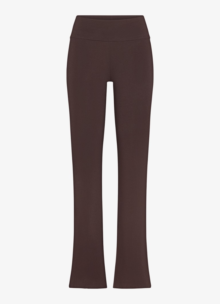 SKIMS Dames Mid waist flared fit loungebroek met stretch in de kleur Bruin, maat: M