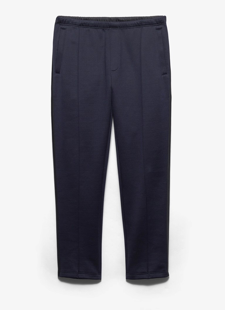 Prada Heren Re-Nylon slim fit trackpants met siernaad in de kleur Donkerblauw