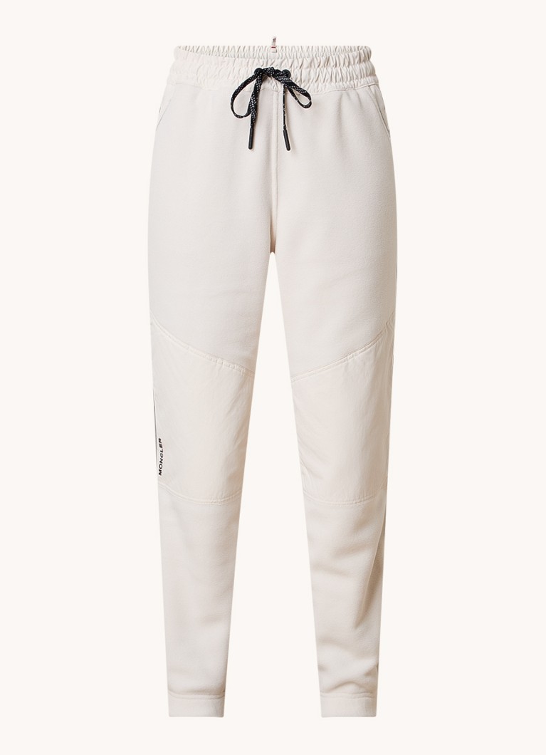 Moncler Dames High waist tapered fit broek met steekzakken in de kleur Gebroken wit, maat: S