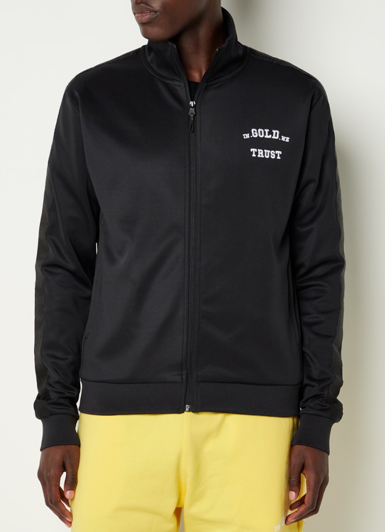In Gold We Trust The Gatlin trackvest met logo en steekzakken • Zwart
