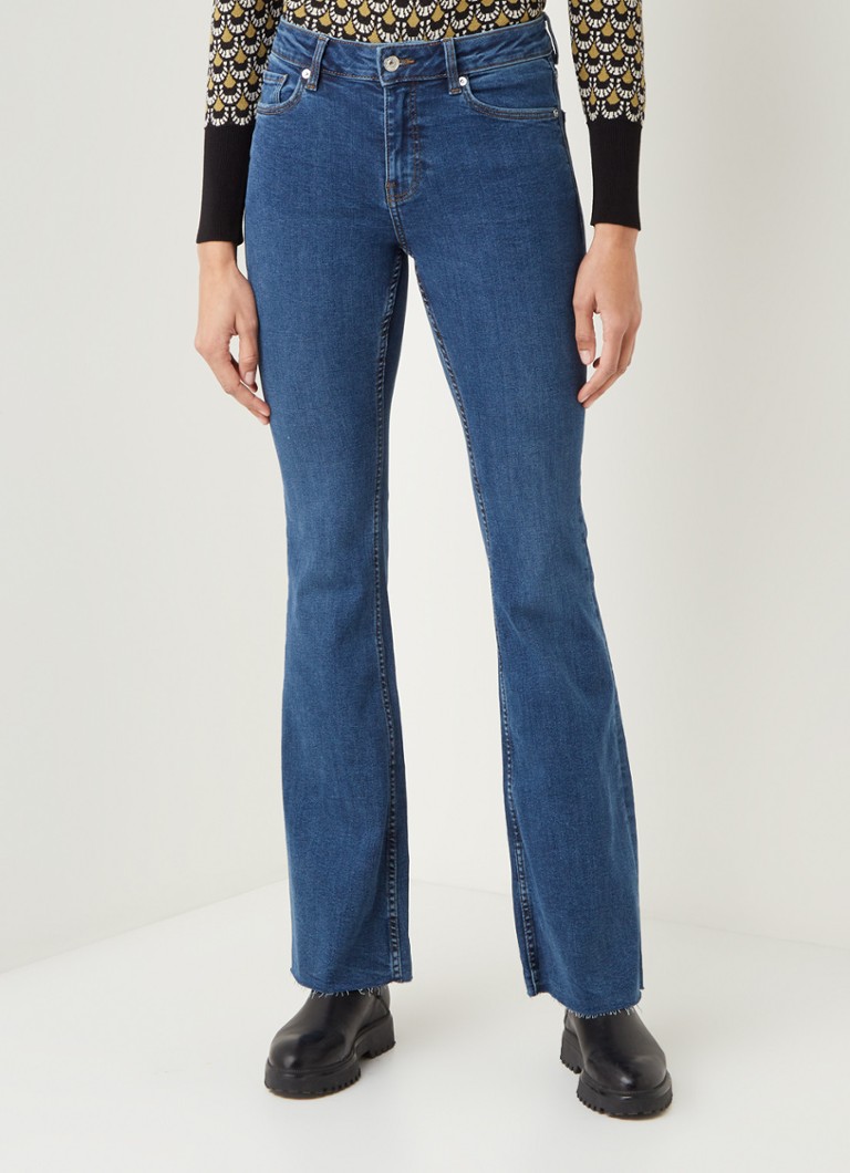 MANGO - Mid waist flared fit jeans met gerafelde zoom - Jeans