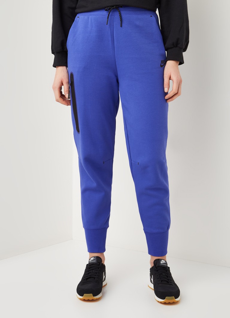 Nike Tech Fleece tapered fit joggingbroek met steekzakken • Paars • de