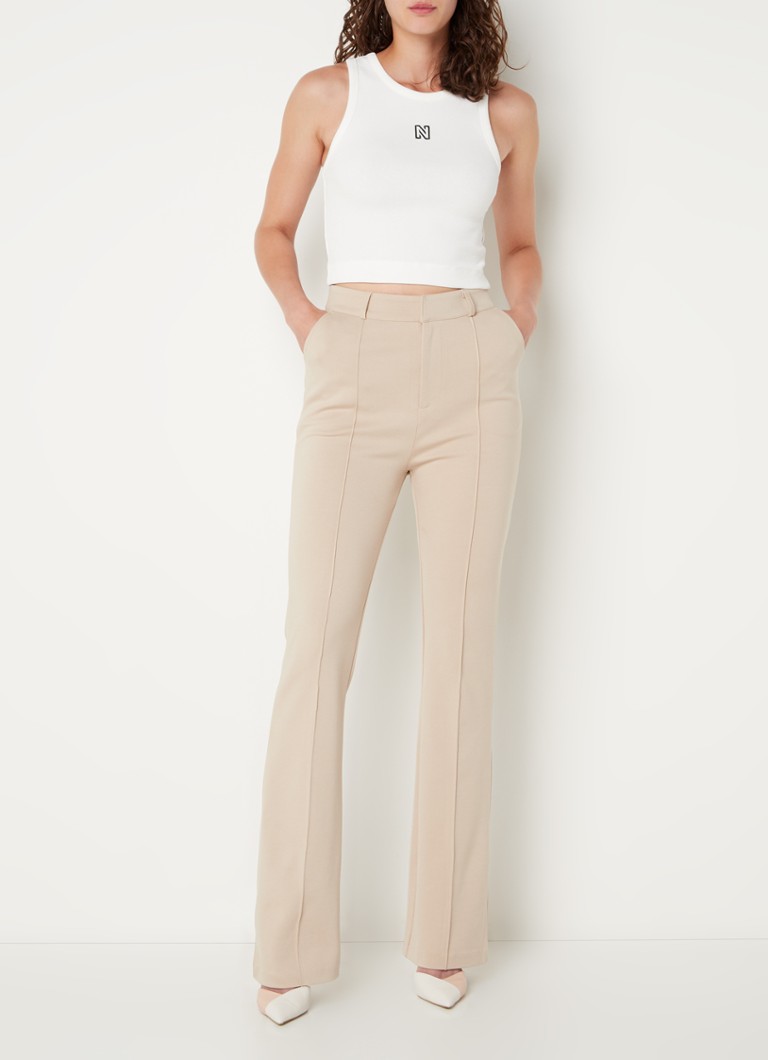 buik Sortie onthouden NIKKIE Punta high waist flared fit pantalon met siernaad • Lichtbruin • de Bijenkorf buik Sortie onthouden NIKKIE Punta high waist flared fit pantalon met siernaad • Lichtbruin • de Bijenkorf