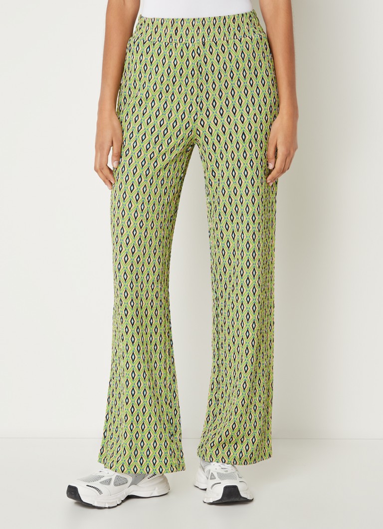 Witte travelstof korte broek met rode grafische print van Mi Piace
