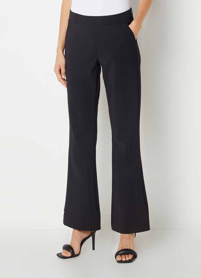 Vijftig een experiment doen Rondlopen Studio Anneloes Flair mid waist flared fit pantalon van travelstof • Zwart  • de Bijenkorf