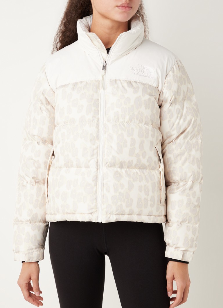 Noord West regenval affix The North Face Retro Nuptse puffer jack met donsvulling en panterprint •  Gebroken wit • de Bijenkorf