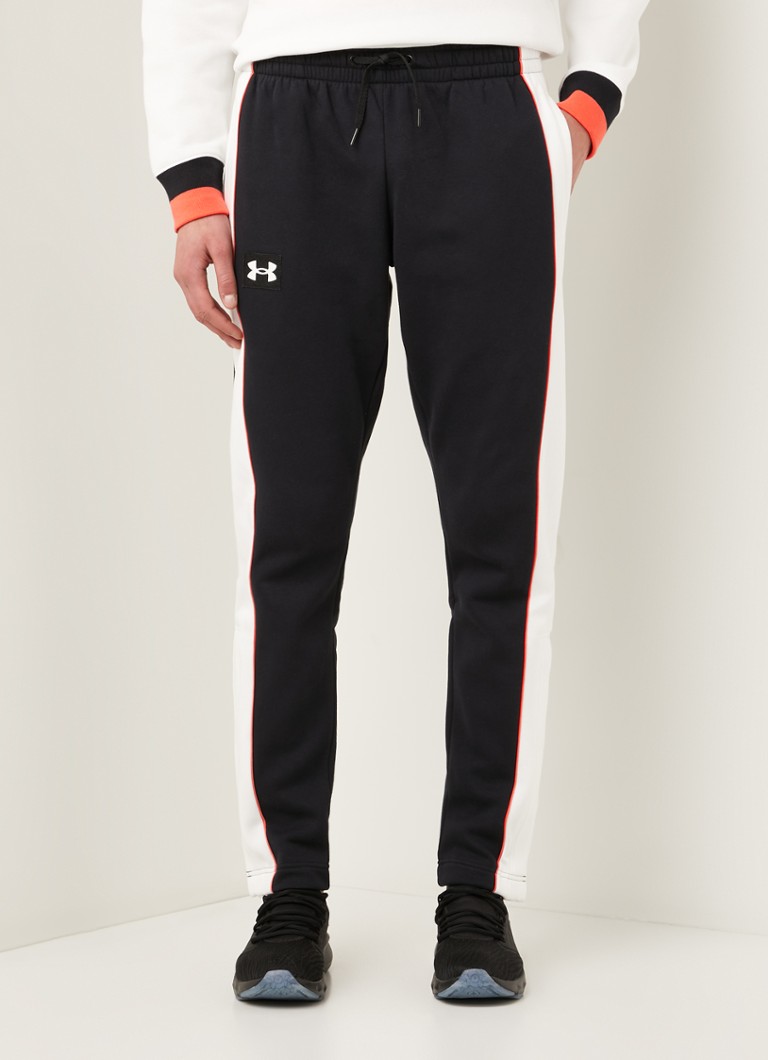 Under Armour Slim fit joggingbroek met bies • Zwart • de Bijenkorf
