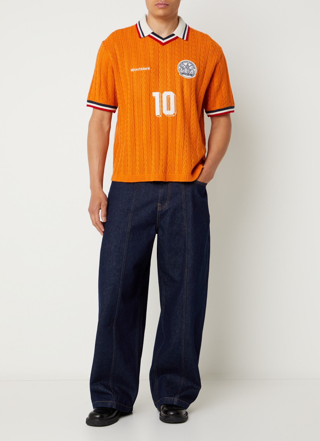 about:blank Worldcup polo met print en structuur - voorkant 2 oranje