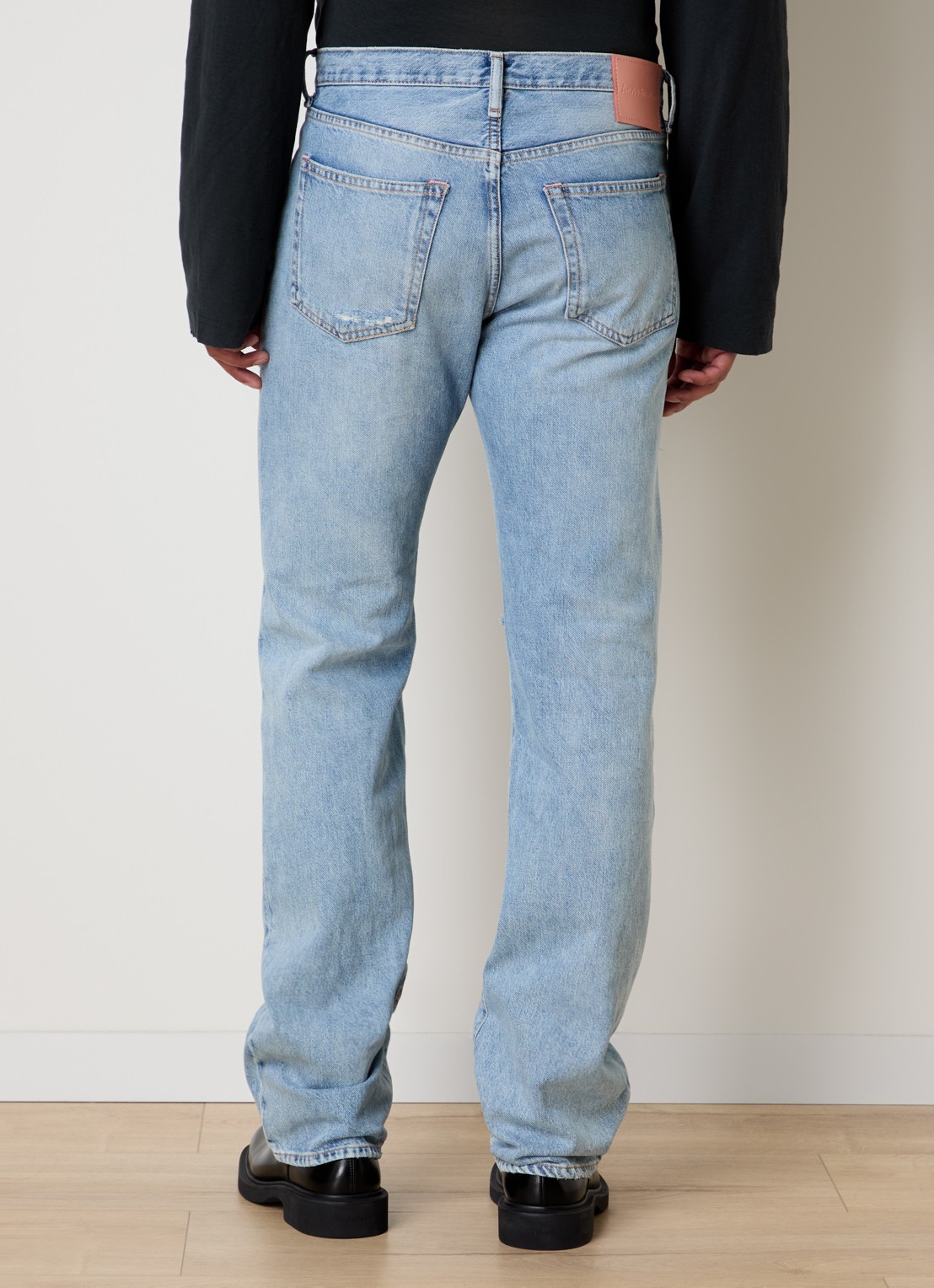 Acne Studios 1996 slim fit jeans met destroyed afwerking - achterkant indigo