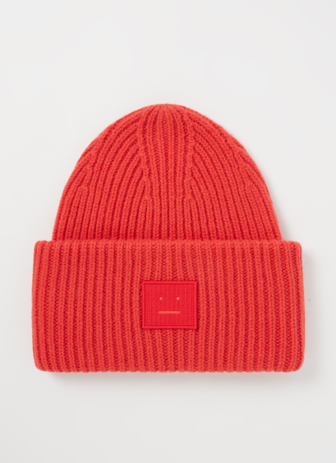 Acne Studios Grofgebreide muts van wol met logo - voorkant steenrood