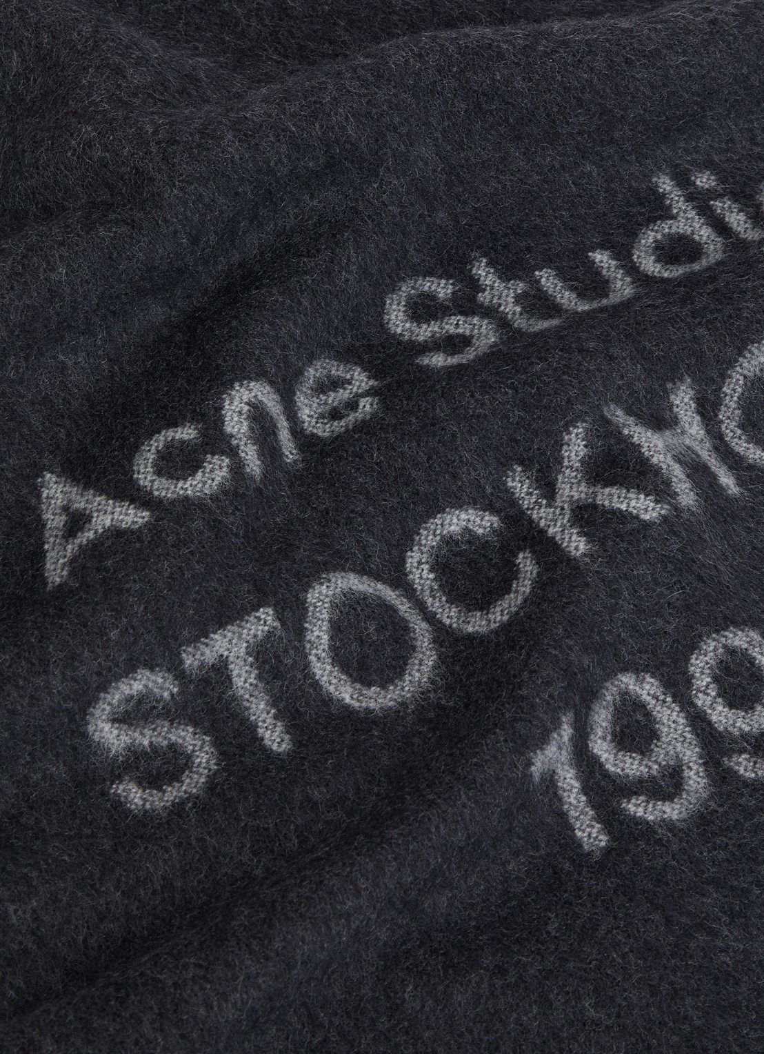 Acne Studios Sjaal van wol met logoprint 43 x 200 cm - detail zwart