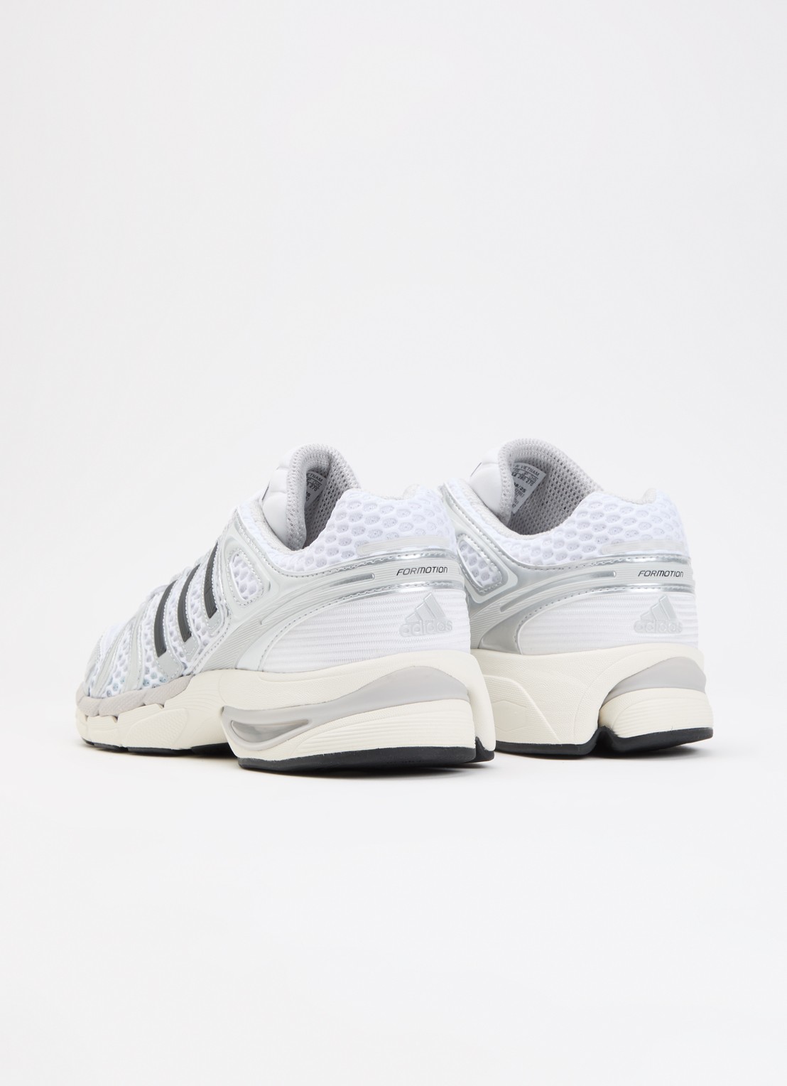 Adidas Adistar Control 5 sneaker met logo  - achterkant zilver