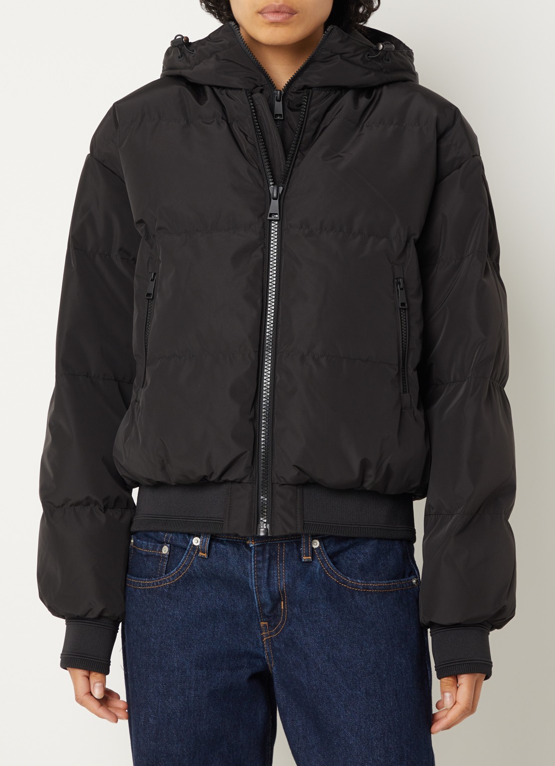 Airforce Bree pufferjack met ritszakken en afneembare capuchon - detail zwart