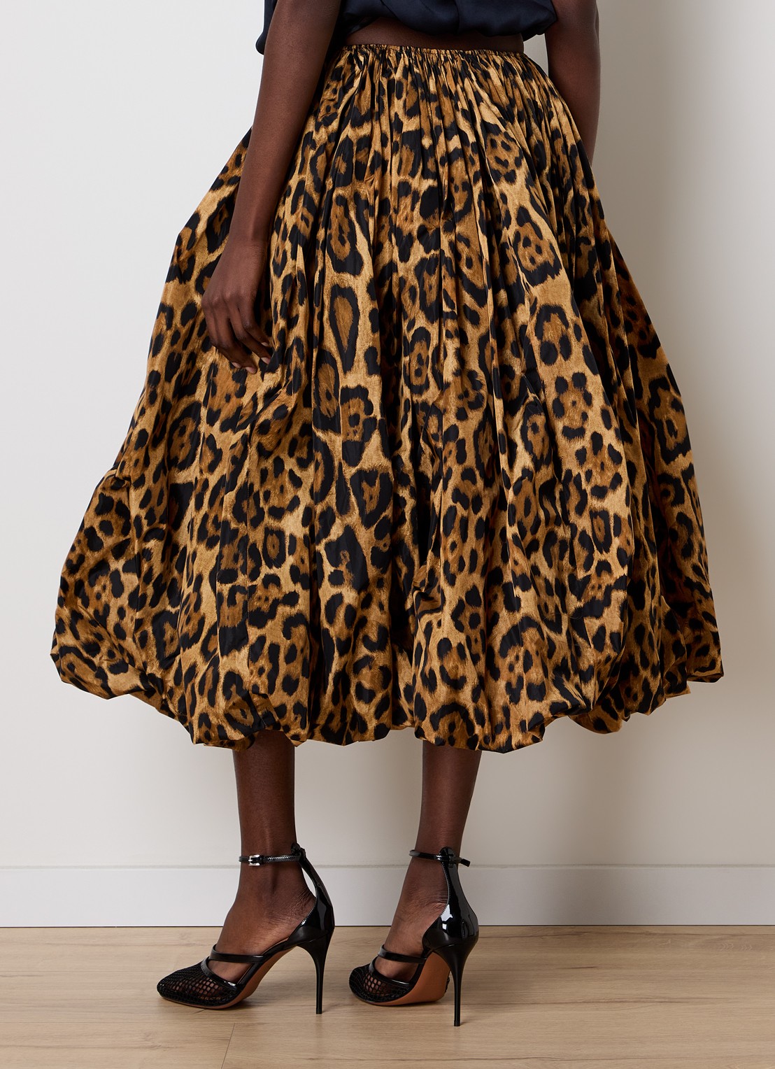 Alaïa A-lijn midi rok met panterprint - achterkant cognac