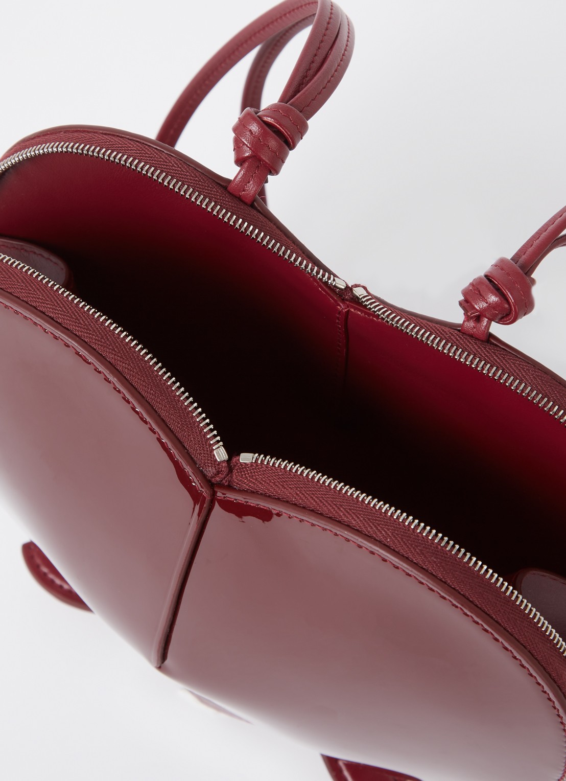 Alaïa Le Coeur crossbodytas van kalfsleer  - detail 3 bordeauxrood