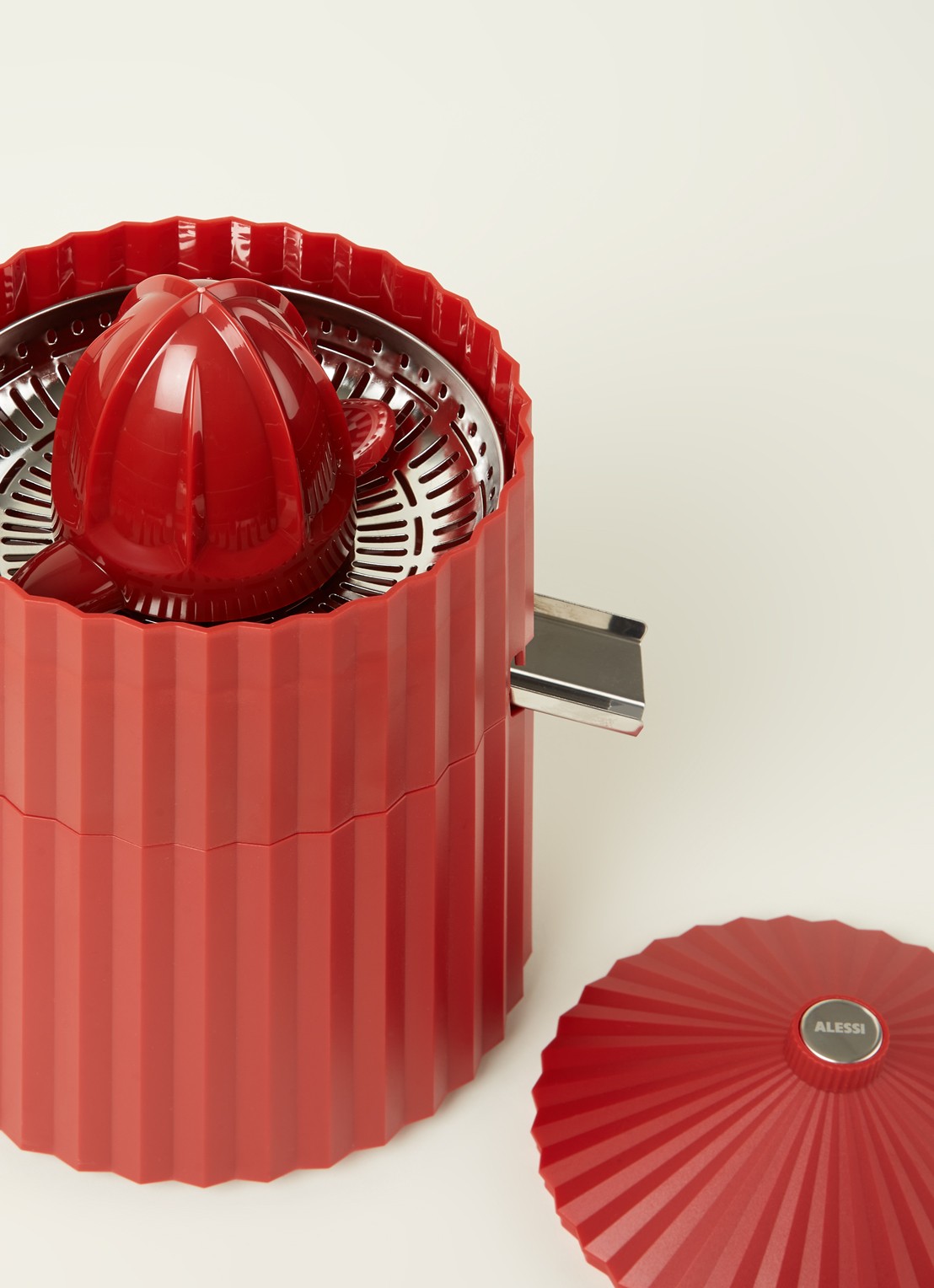 Alessi Plissé elektrische citruspers MDL07R - detail steenrood