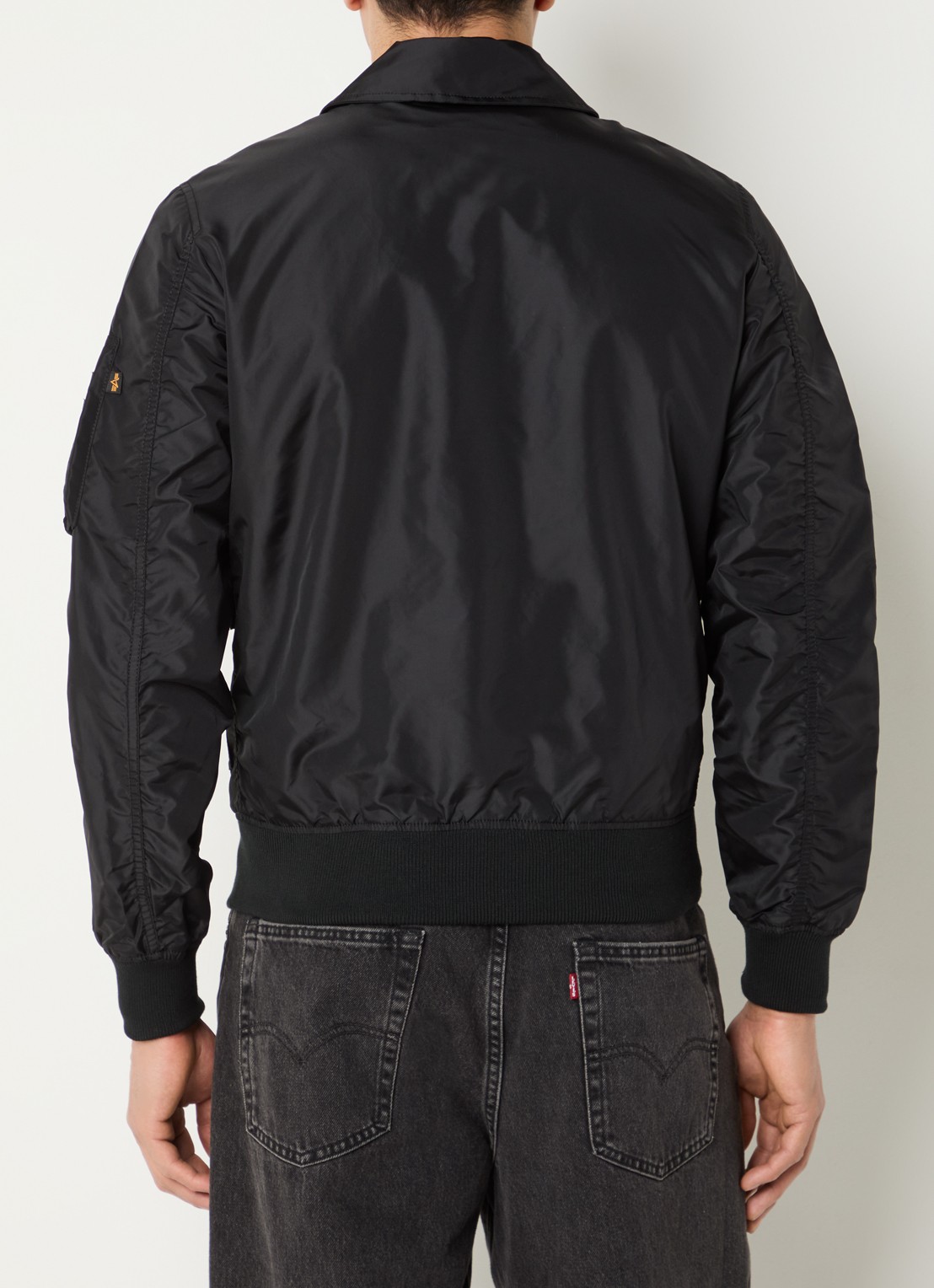Alpha Industries CWU-36 bomberjack met klepzakken - achterkant zwart