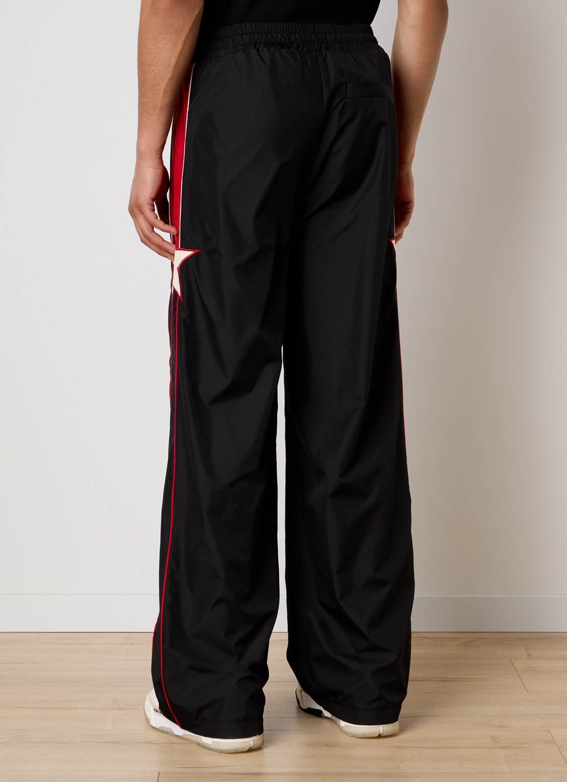 AMIRI Loose fit trackpants met logo en steekzakken - achterkant zwart