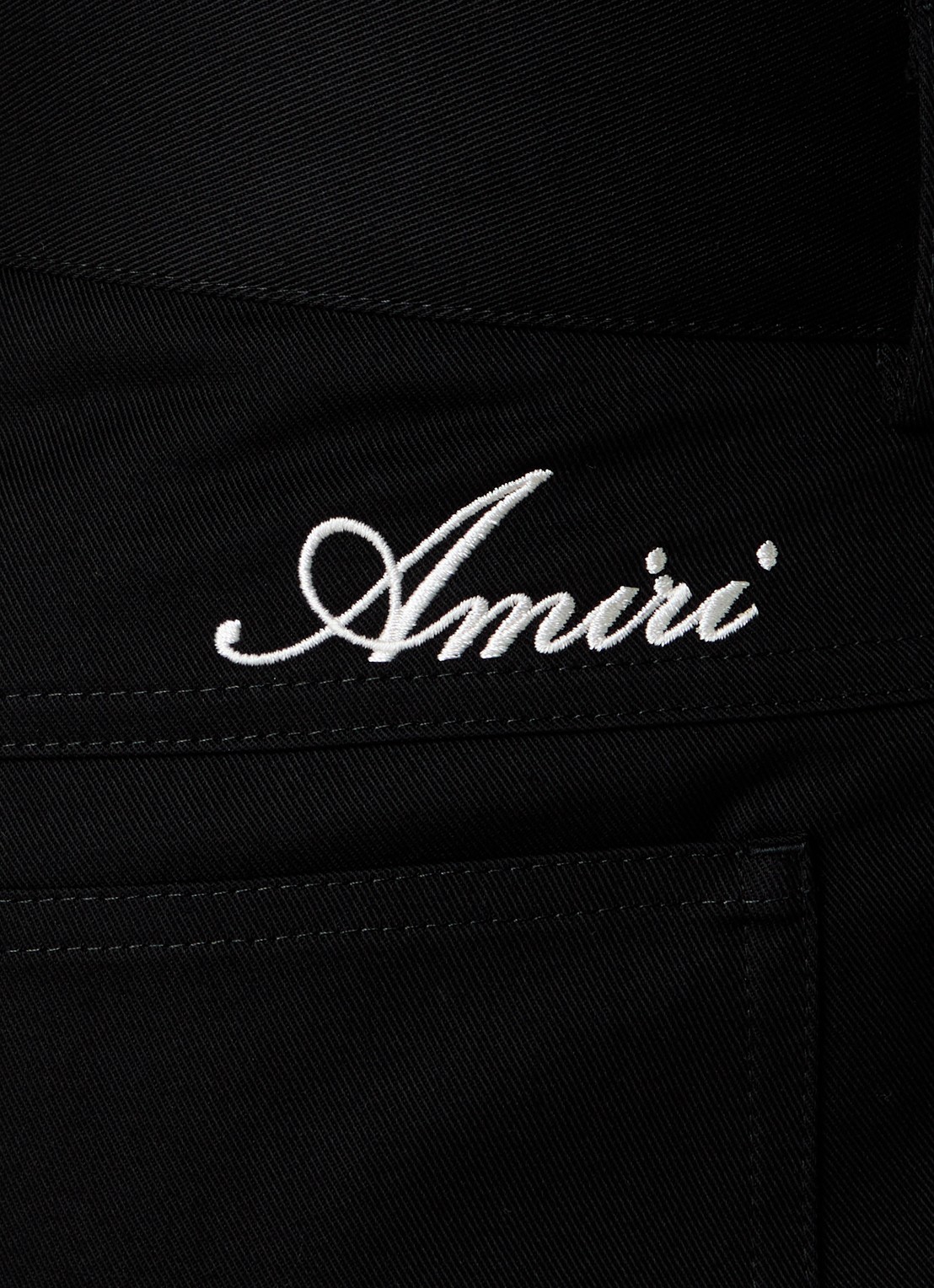AMIRI Script flared jeans met logo en gekleurde wassing - detail 3 zwart