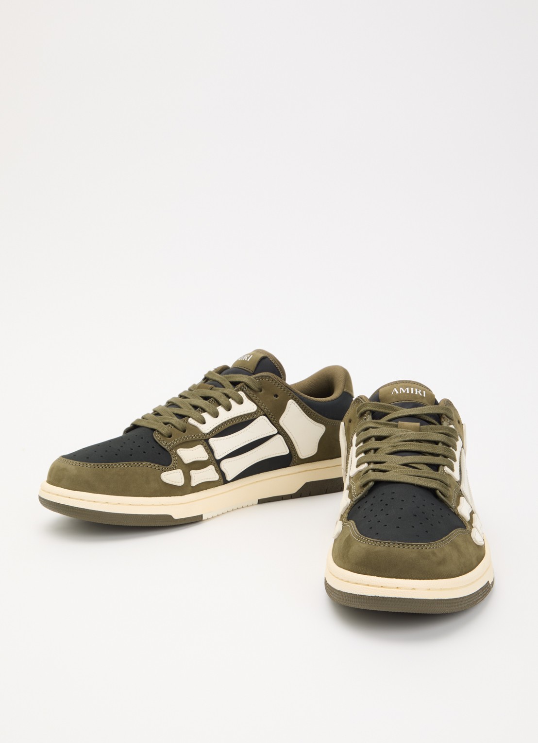 AMIRI Skel Top Low sneaker van suède met leren details - detail bronsgroen