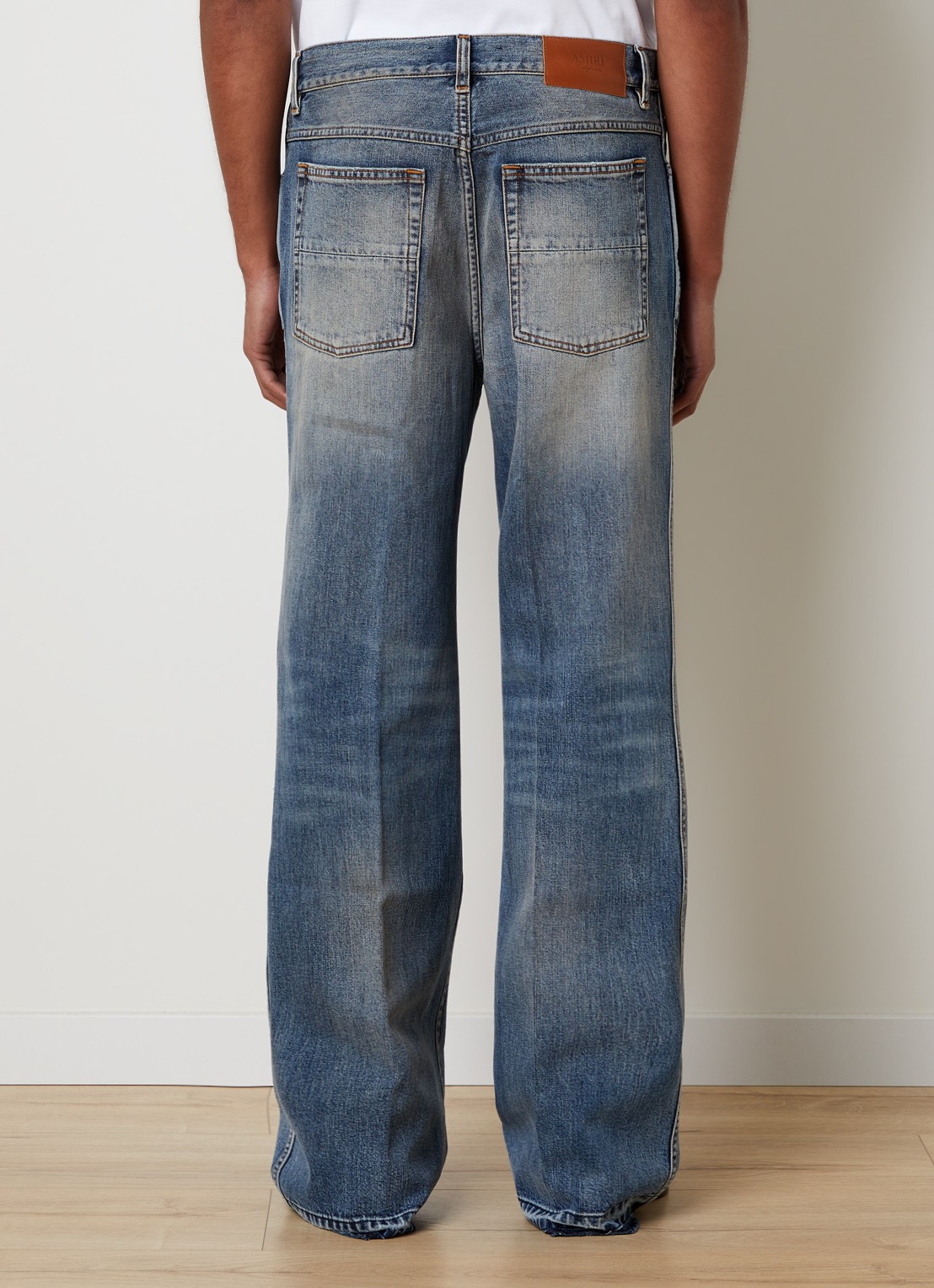 AMIRI Straight leg jeans met verwassen afwerking - achterkant indigo