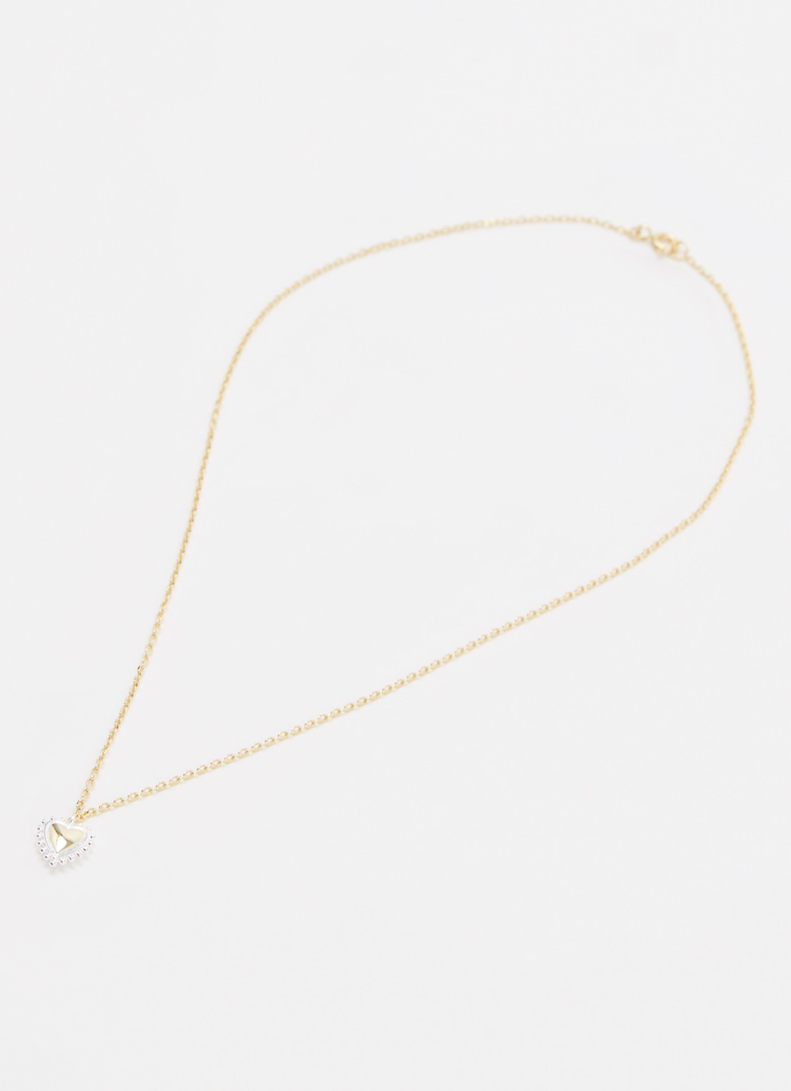 Anna + Nina Bravery Heart ketting  - detail goud