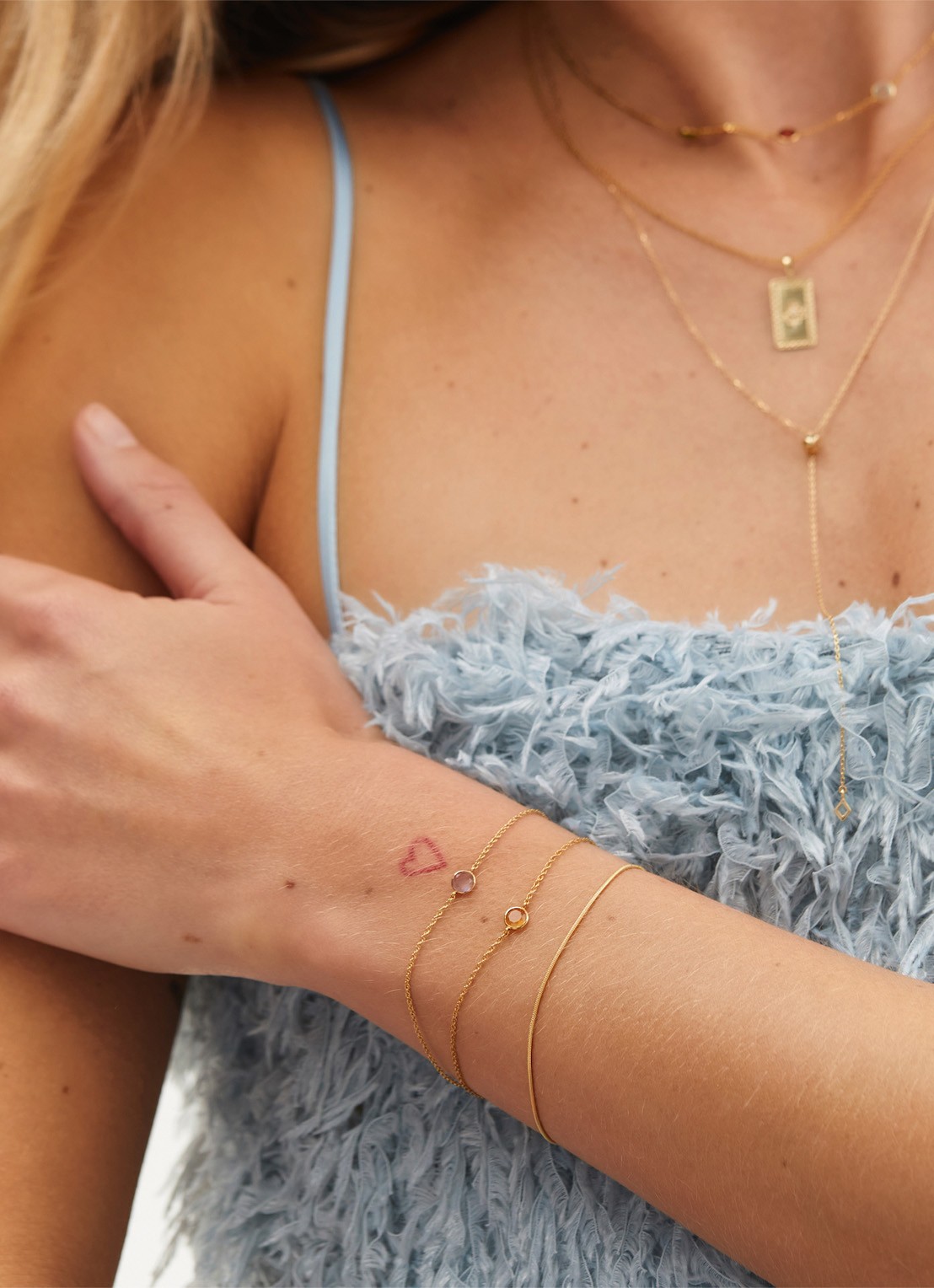 Anna + Nina Snake armband van 14 karaat geelgoud - voorkant 3 geelgoud
