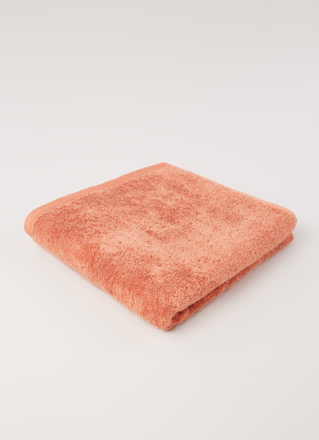 Aquanova London badlaken 70 cm x 130 cm - voorkant 3 lichtoranje