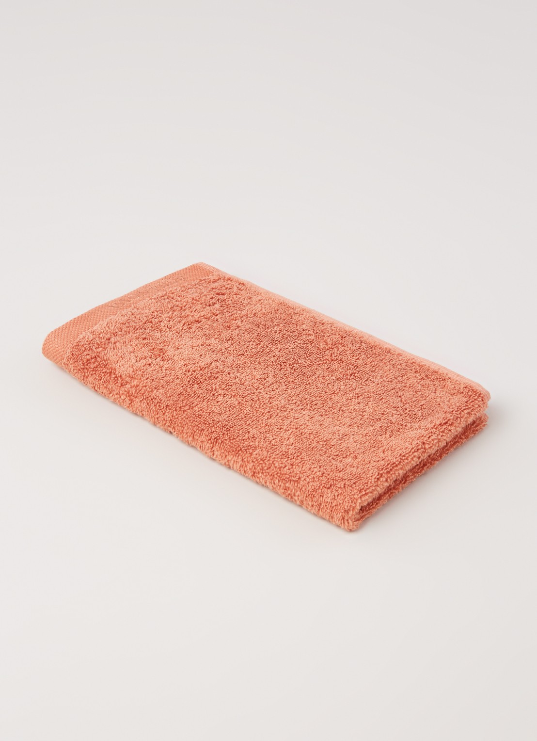 Aquanova London gastendoek 30 cm x 50 cm - voorkant 3 lichtoranje